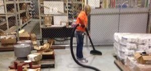 Technician Cleaning Up Water From Garage Flood